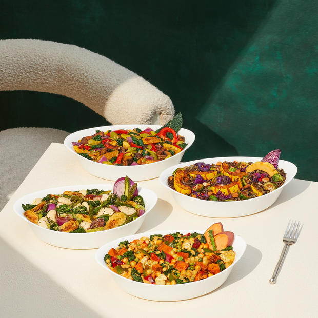 Four plated dishes from Daily Harvest's Harvest Bakes collection 