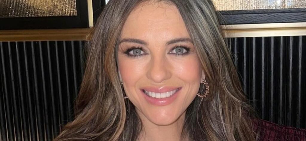 Elizabeth Hurley In Plunging Swimsuit Promises ‘Way Less Breathing In’