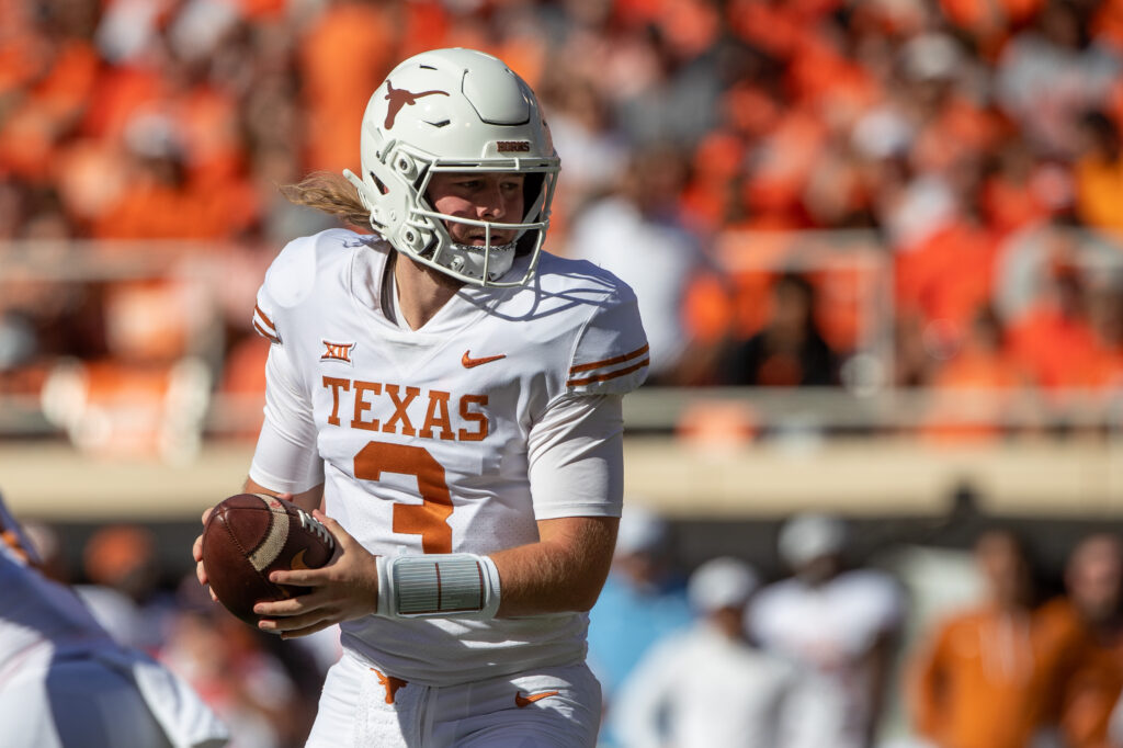 Texas Longhorns quarterback Quinn Ewers looks to pass against Oklahoma State.